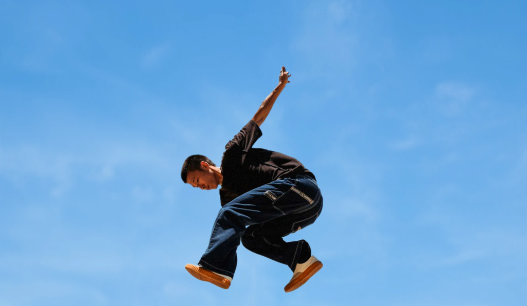 Photo of a man jumping.