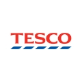 Tesco logo icon in a white circle.